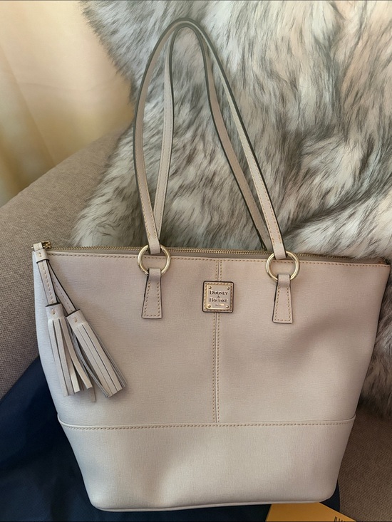 Dooney & Bourke Handbags - Dooney & Bourke Beige Saffiano leather Tobi Tote with Tassel & dust bag.